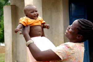 Black mother and child happy- transitioning from working mother to stay at home mother